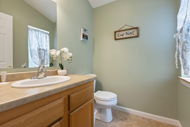 1313 Deer Run, Casco, ME 04015 - bathroom featuring vanity, tile patterned flooring, and vaulted ceiling