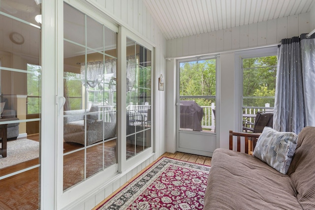1313 Deer Run, Casco, ME 04015 - sunroom / solarium featuring wood finished floors and lofted ceiling