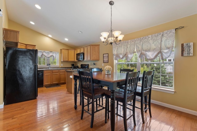 1313 Deer Run, Casco, ME 04015 - dining room with a chandelier, plenty of natural light, light wood-style flooring, lofted ceiling, and recessed lighting