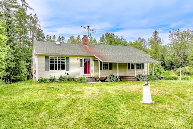 421 Cushing Rd, Cushing, ME 04563 - single story home featuring a chimney, a front lawn, a porch, and roof with shingles