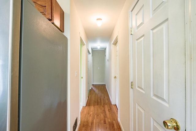 421 Cushing Rd, Cushing, ME 04563 - hall with light wood-style flooring and baseboards