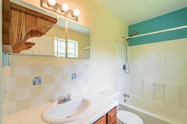 421 Cushing Rd, Cushing, ME 04563 - full bathroom featuring vanity, shower / washtub combination, and backsplash