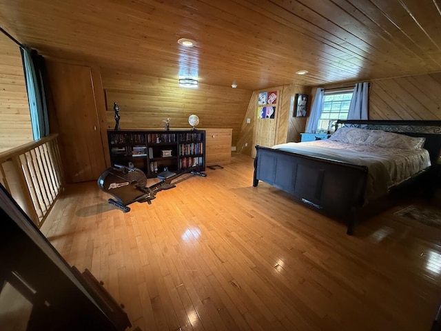 631 US Rt 1, Robbinston, ME 04671 - bedroom with wood walls, hardwood / wood-style flooring, and wooden ceiling