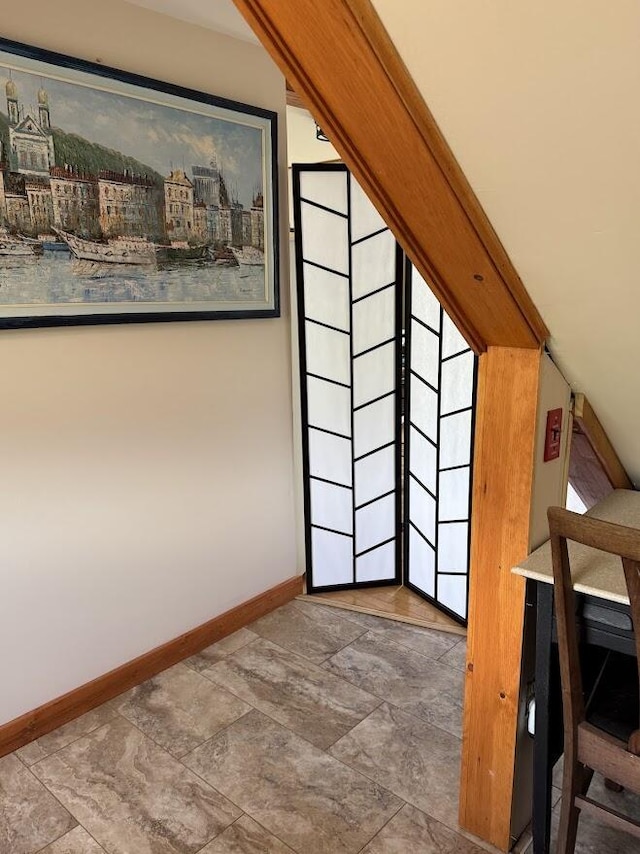 631 US Rt 1, Robbinston, ME 04671 - additional living space featuring baseboards and stone finish floors