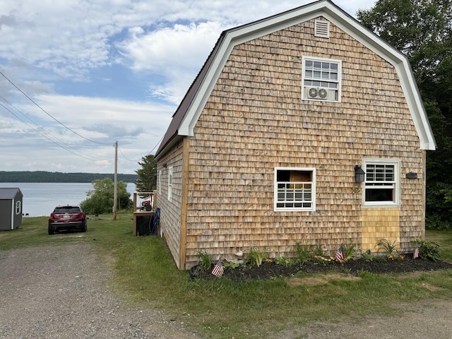 631 US Rt 1, Robbinston, ME 04671 - view of home's exterior with a gambrel roof