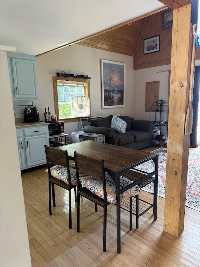 631 US Rt 1, Robbinston, ME 04671 - dining room with lofted ceiling and light wood-style floors
