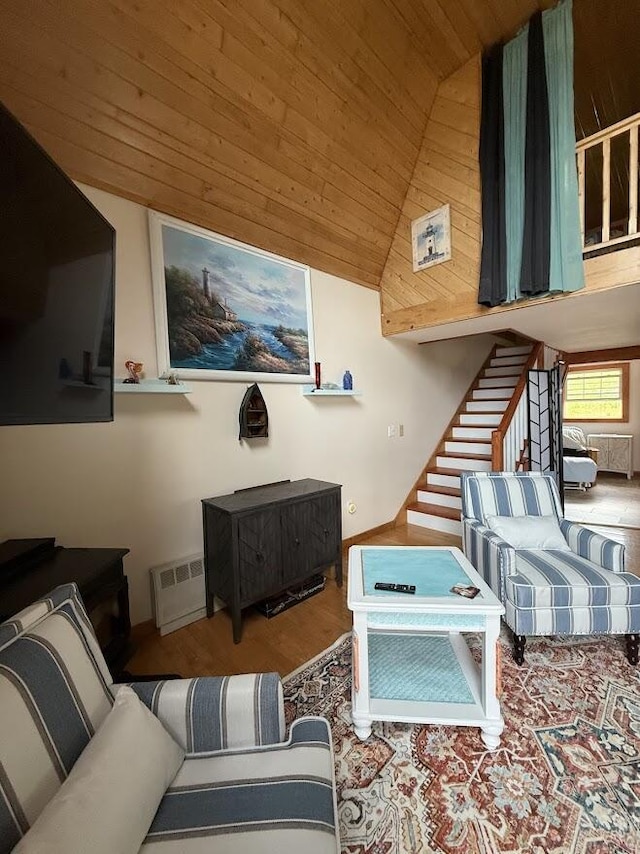 631 US Rt 1, Robbinston, ME 04671 - living room featuring wooden ceiling, stairs, vaulted ceiling, and wood finished floors