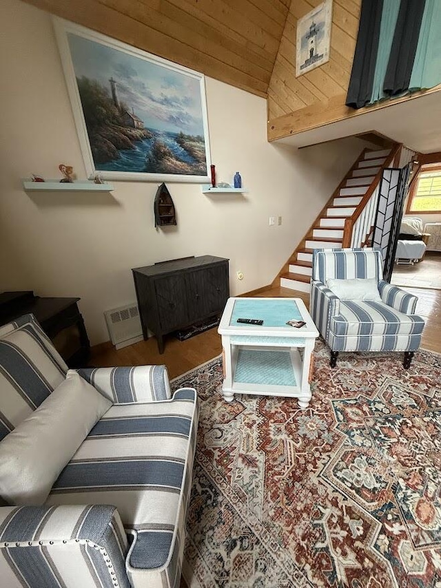 631 US Rt 1, Robbinston, ME 04671 - living room with stairs, wood finished floors, lofted ceiling, and wooden ceiling