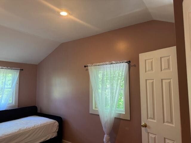 27 Dodge Rd, Edgecomb, ME 04556 - bedroom with lofted ceiling and baseboards