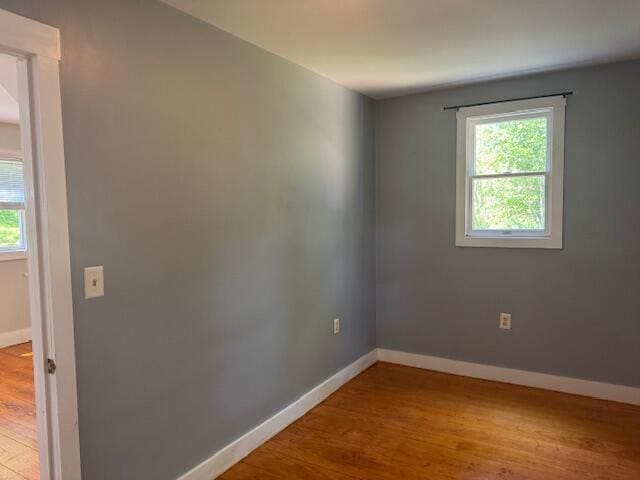 27 Dodge Rd, Edgecomb, ME 04556 - empty room with plenty of natural light and wood finished floors