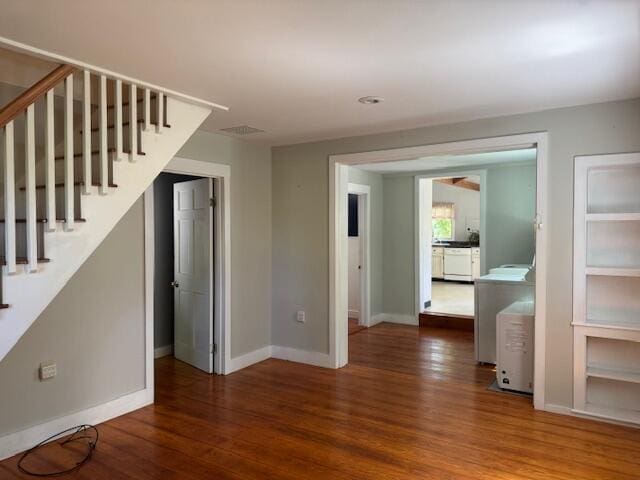 27 Dodge Rd, Edgecomb, ME 04556 - spare room with wood finished floors and stairway