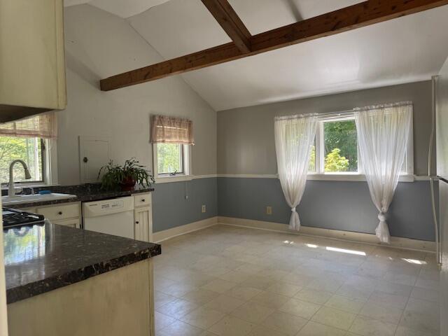 27 Dodge Rd, Edgecomb, ME 04556 - kitchen with dishwasher, dark stone countertops, and white cabinetry