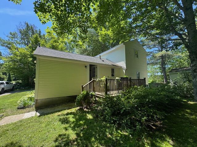 27 Dodge Rd, Edgecomb, ME 04556 - back of house featuring a deck and a yard