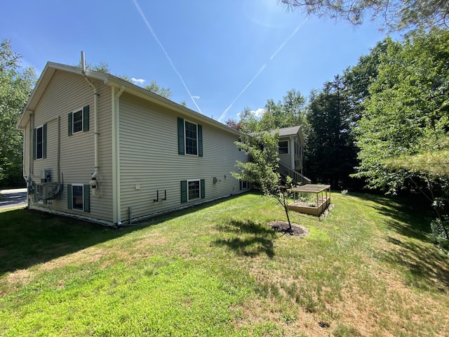 48 Stoney Ridge Rd, Eddington, ME 04428 - view of home's exterior with a lawn