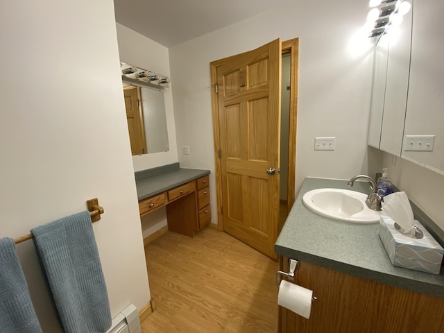 48 Stoney Ridge Rd, Eddington, ME 04428 - bathroom featuring vanity and wood finished floors