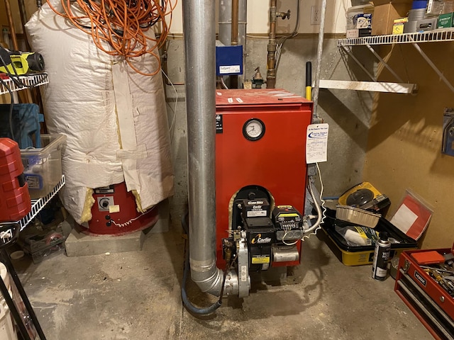 48 Stoney Ridge Rd, Eddington, ME 04428 - utility room featuring a heating unit