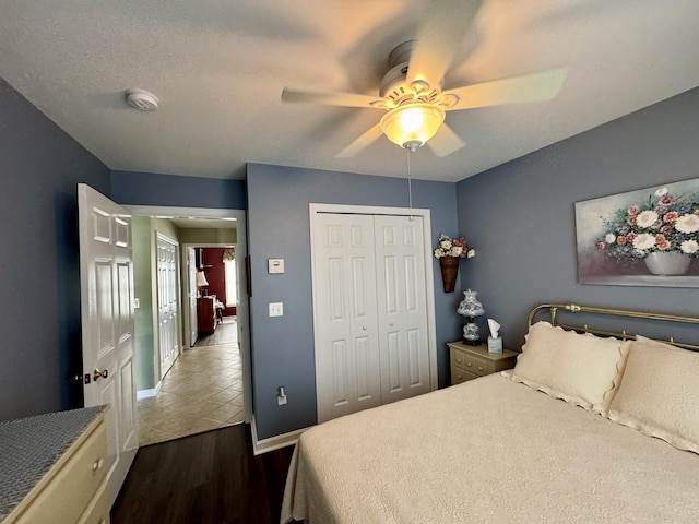 35A Birchbrook Ln Unit 35A, Levant, ME 04456 - bedroom with a closet, wood finished floors, and ceiling fan