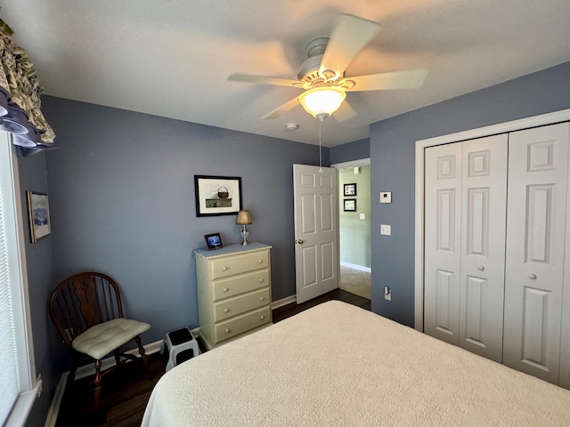 35A Birchbrook Ln Unit 35A, Levant, ME 04456 - bedroom with dark wood-style flooring, a closet, and ceiling fan