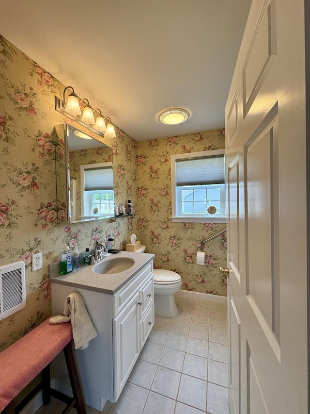 35A Birchbrook Ln Unit 35A, Levant, ME 04456 - half bathroom featuring tile patterned floors, vanity, and wallpapered walls