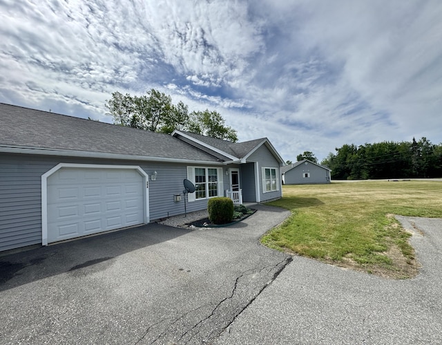 35A Birchbrook Ln Unit 35A, Levant, ME 04456 - ranch-style home featuring a garage, driveway, a front lawn, and roof with shingles