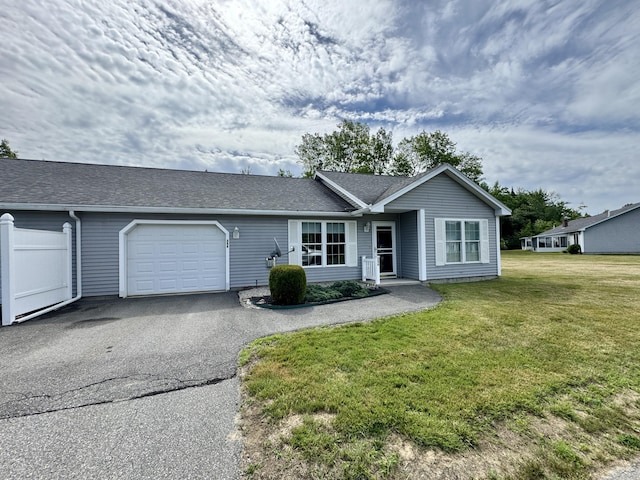 35A Birchbrook Ln Unit 35A, Levant, ME 04456 - ranch-style home with a garage, asphalt driveway, a front yard, and roof with shingles