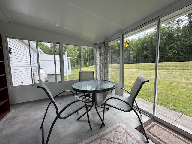35A Birchbrook Ln Unit 35A, Levant, ME 04456 - sunroom / solarium with vaulted ceiling and outdoor dining area