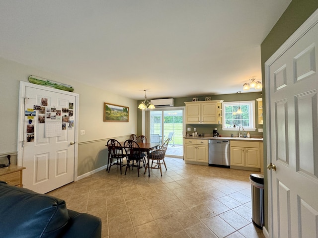 35A Birchbrook Ln Unit 35A, Levant, ME 04456 - kitchen with stainless steel dishwasher, a wall unit AC, light tile patterned floors, and light countertops