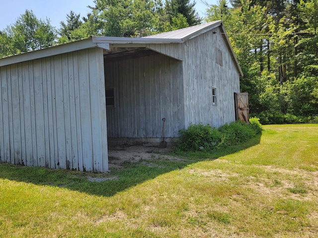 183 Folsom Pond Rd, Lincoln, ME 04457 - view of pole building featuring a lawn