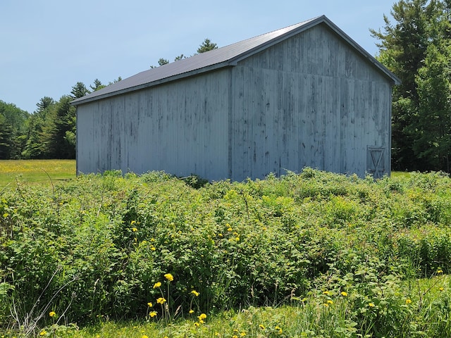 183 Folsom Pond Rd, Lincoln, ME 04457 - view of outdoor structure featuring a view of trees