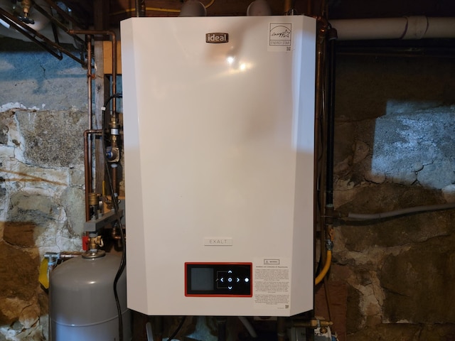 183 Folsom Pond Rd, Lincoln, ME 04457 - utilities featuring water heater