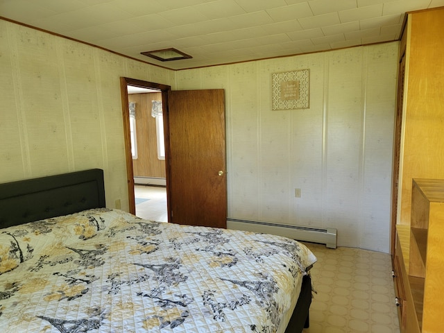 183 Folsom Pond Rd, Lincoln, ME 04457 - bedroom with a baseboard radiator and light floors