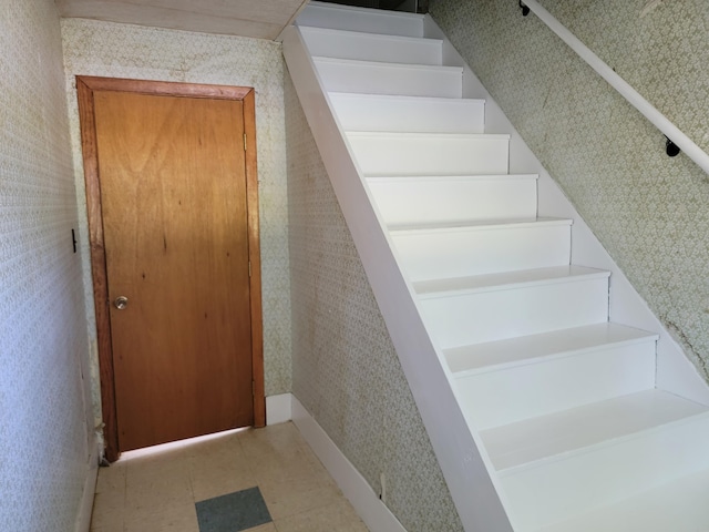 183 Folsom Pond Rd, Lincoln, ME 04457 - stairs with wallpapered walls