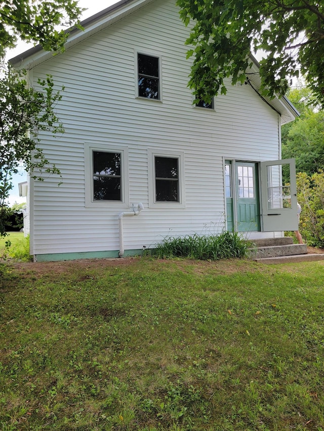 183 Folsom Pond Rd, Lincoln, ME 04457 - back of property with a lawn