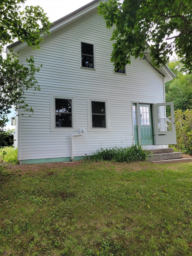 183 Folsom Pond Rd, Lincoln, ME 04457 - back of property with a lawn