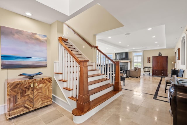 121 Bald Head Cliff Rd, York, ME 03902 - stairway featuring a raised ceiling, tile patterned floors, and recessed lighting