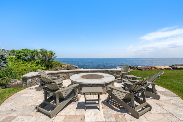 121 Bald Head Cliff Rd, York, ME 03902 - view of patio with a water view and a fire pit