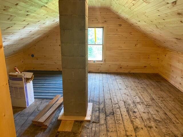 6 Chicken St, Starks, ME 04911 - bonus room with wooden walls, lofted ceiling, hardwood / wood-style floors, and wood ceiling