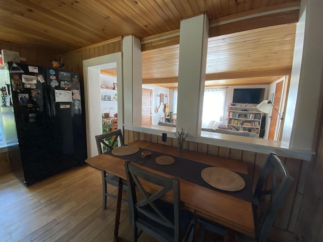 6 Chicken St, Starks, ME 04911 - dining room featuring wood ceiling, wood-type flooring, and wood walls