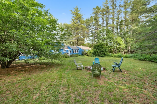 97 Forest Ave, Orono, ME 04473 - view of green lawn with a fire pit