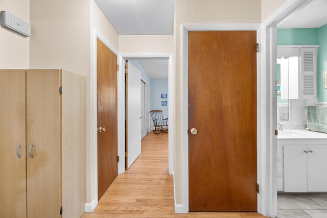 97 Forest Ave, Orono, ME 04473 - hallway featuring a sink and light wood finished floors