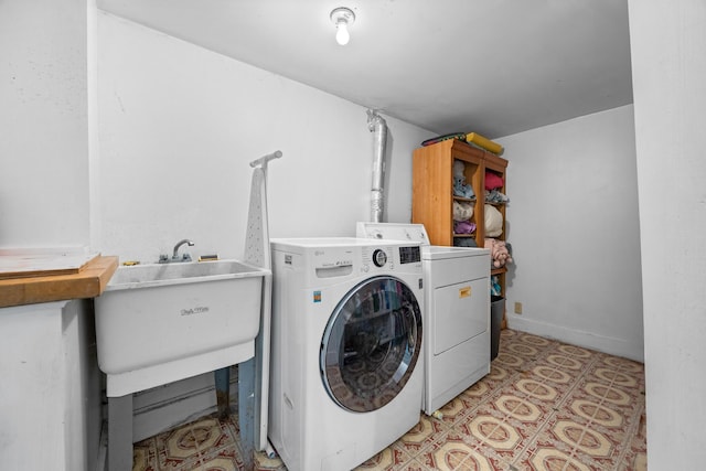 97 Forest Ave, Orono, ME 04473 - laundry area featuring washer and dryer and a sink
