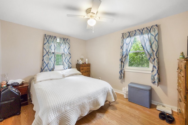 119 Falvey St, Bangor, ME 04401 - bedroom with light wood-style flooring and ceiling fan