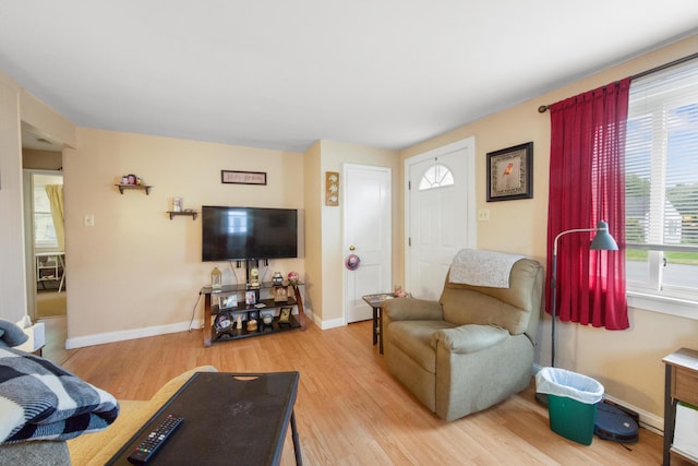 119 Falvey St, Bangor, ME 04401 - living area with wood finished floors and baseboards