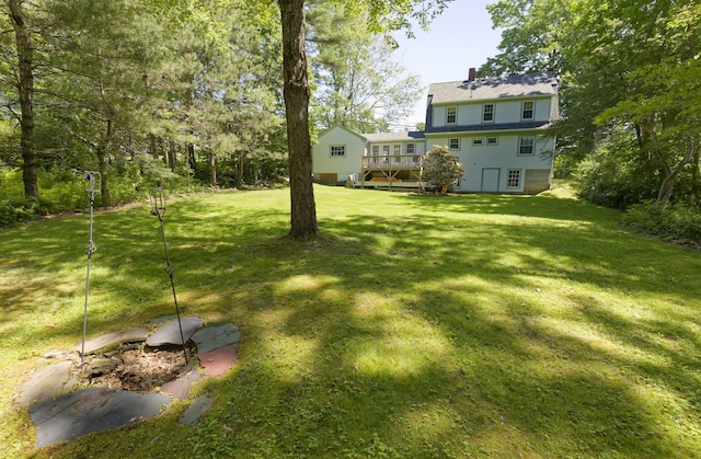 302 Townsend Ave, Boothbay Harbor, ME 04538 - view of grassy yard with a wooden deck