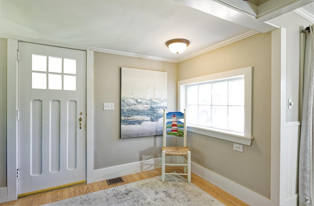 302 Townsend Ave, Boothbay Harbor, ME 04538 - foyer entrance featuring wood finished floors and crown molding