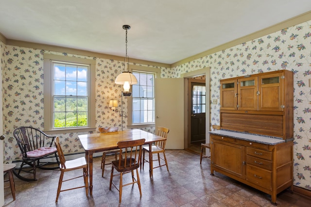 426 Meadow Rd, Topsham, ME 04086 - dining space with wallpapered walls, healthy amount of natural light, and a baseboard radiator