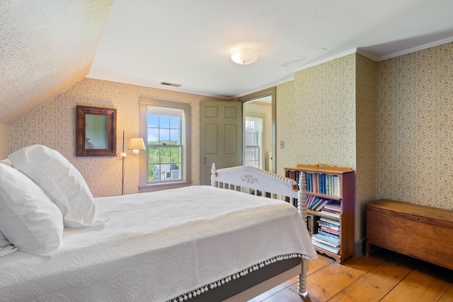 426 Meadow Rd, Topsham, ME 04086 - bedroom with wallpapered walls, hardwood / wood-style floors, and ornamental molding