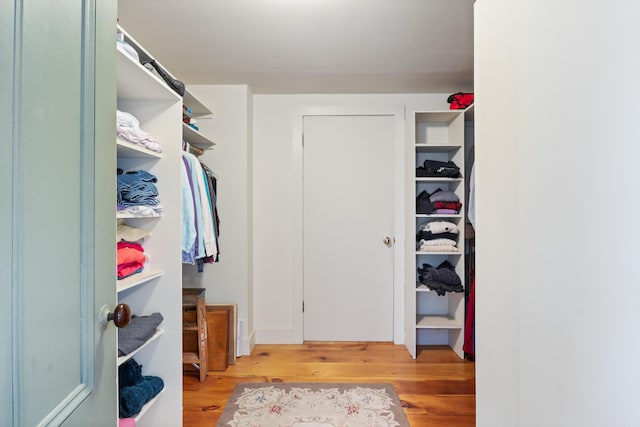 426 Meadow Rd, Topsham, ME 04086 - spacious closet featuring wood finished floors