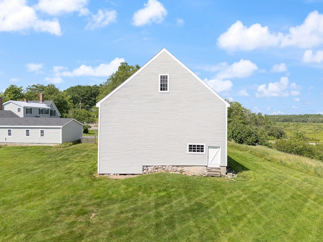 426 Meadow Rd, Topsham, ME 04086 - view of home's exterior with entry steps and a yard