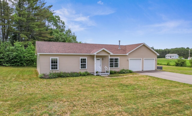 31 Silas Warren Dr, Hermon, ME 04401 - ranch-style house with a garage, asphalt driveway, a front lawn, and roof with shingles